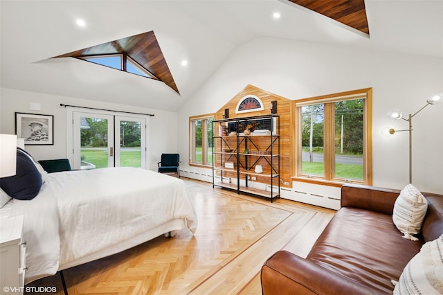2650 Wickham Ave, Mattituck, NY 11952 - bedroom featuring access to outside, french doors, multiple windows, high vaulted ceiling, and baseboard heating