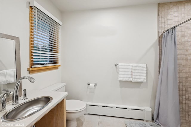 2650 Wickham Ave, Mattituck, NY 11952 - bathroom featuring a baseboard radiator, toilet, vanity, tile patterned flooring, and tiled shower
