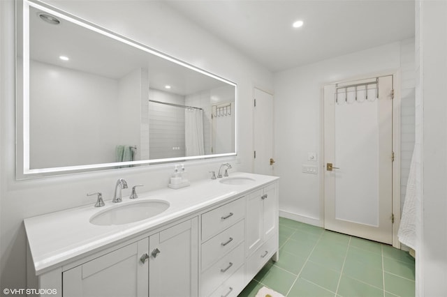 2650 Wickham Ave, Mattituck, NY 11952 - full bath featuring double vanity, tile patterned flooring, a shower with shower curtain, and recessed lighting