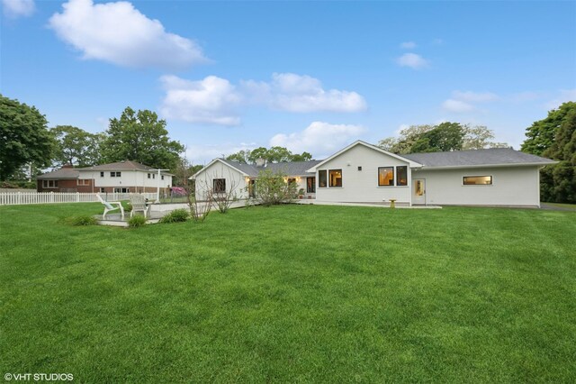 2650 Wickham Ave, Mattituck, NY 11952 - back of property with a patio area