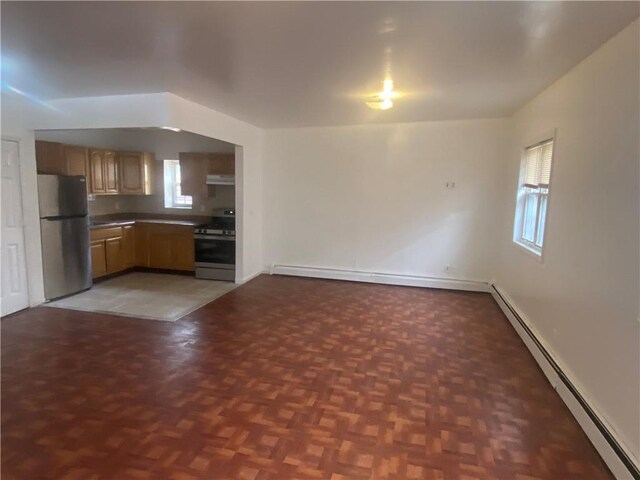 960 E 181st St, Bronx, NY 10460 - kitchen featuring freestanding refrigerator, stainless steel range with gas stovetop, plenty of natural light, and a baseboard heating unit