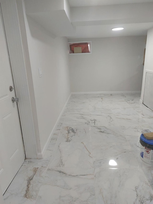 11 John Ave, Hempstead, NY 11003 - basement with marble finish flooring and baseboards