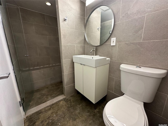 9-01 127th St, College Point, NY 11356 - full bath featuring toilet, vanity, concrete flooring, a tile shower, and tile walls