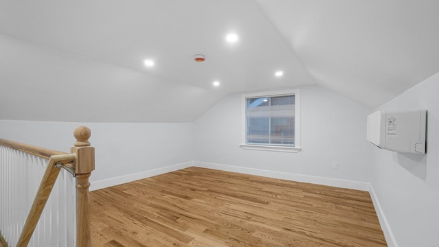 3919 Murdock Ave, Bronx, NY 10466 - bonus room featuring light wood-type flooring, vaulted ceiling, and recessed lighting
