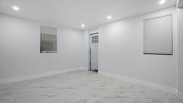 3919 Murdock Ave, Bronx, NY 10466 - spare room featuring recessed lighting and light marble finish floors