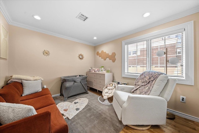 435 E Broadway Unit A, Long Beach, NY 11561 - sitting room featuring wood finished floors, ornamental molding, and recessed lighting