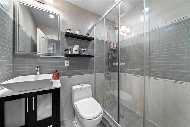 435 E Broadway Unit A, Long Beach, NY 11561 - full bath featuring tile walls, vanity, and a shower stall