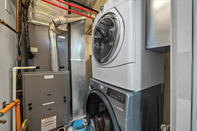 435 E Broadway Unit A, Long Beach, NY 11561 - washroom with stacked washer / drying machine and heating unit