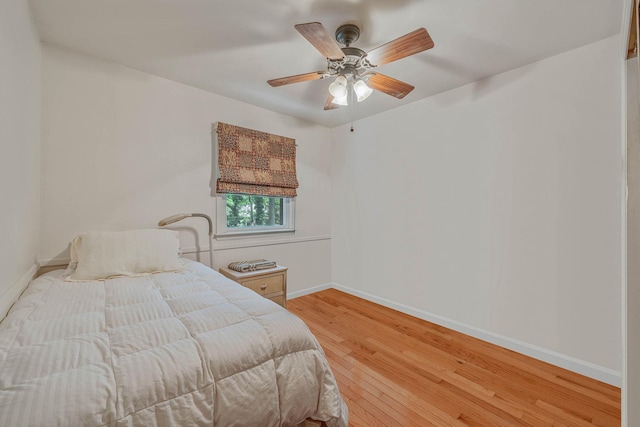 114 Oakwood Dr, Wading River, NY 11792 - bedroom featuring light wood-style floors, baseboards, and ceiling fan