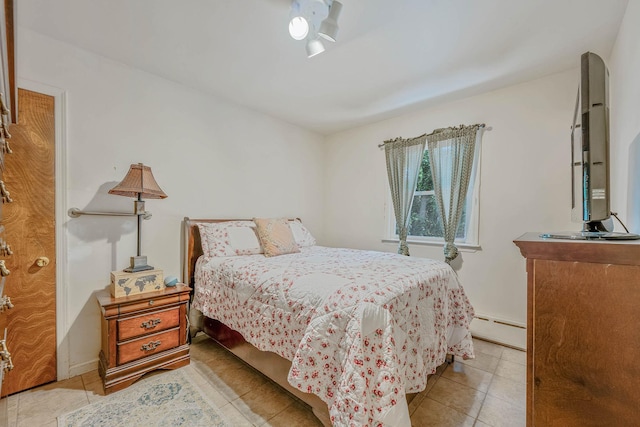 114 Oakwood Dr, Wading River, NY 11792 - bedroom with a baseboard radiator and tile patterned flooring