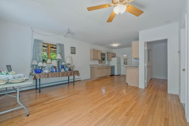 114 Oakwood Dr, Wading River, NY 11792 - living room with light wood-style flooring, a baseboard radiator, and ceiling fan