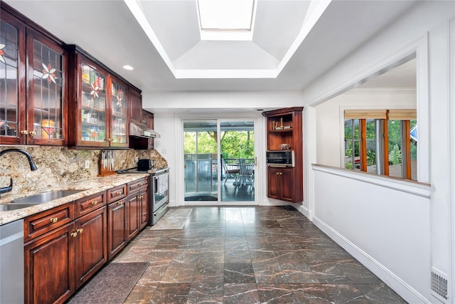 15 Fairway Dr, Old Bethpage, NY 11804 - bar featuring stainless steel appliances, a tray ceiling, dark marble finish flooring, backsplash, and under cabinet range hood
