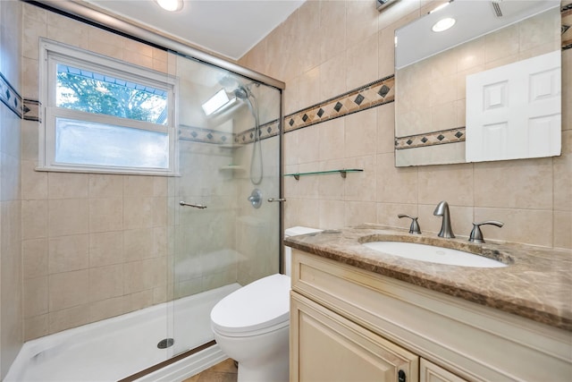 15 Fairway Dr, Old Bethpage, NY 11804 - bathroom featuring a shower stall, vanity, tile walls, and decorative backsplash