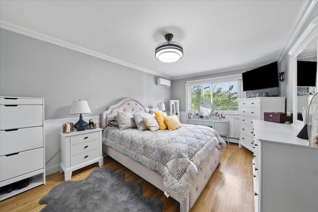 200 Merrick Rd Unit R, Amityville, NY 11701 - bedroom with a wall mounted AC, ornamental molding, light wood finished floors, and a baseboard radiator