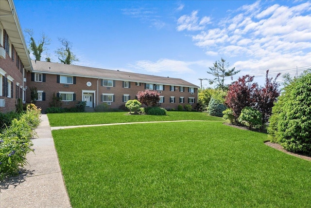 200 Merrick Rd Unit R, Amityville, NY 11701 - surrounding community with a yard