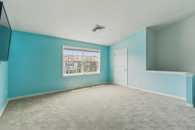 1512 Willow Ln, Valley Stream, NY 11580 - carpeted empty room with baseboards and lofted ceiling