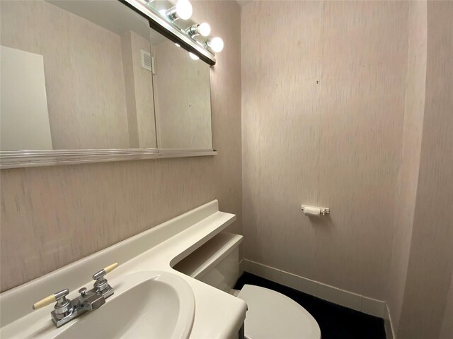 27110 Grand Central Pkwy Unit 11A, Floral Park, NY 11005 - bathroom featuring vanity and toilet