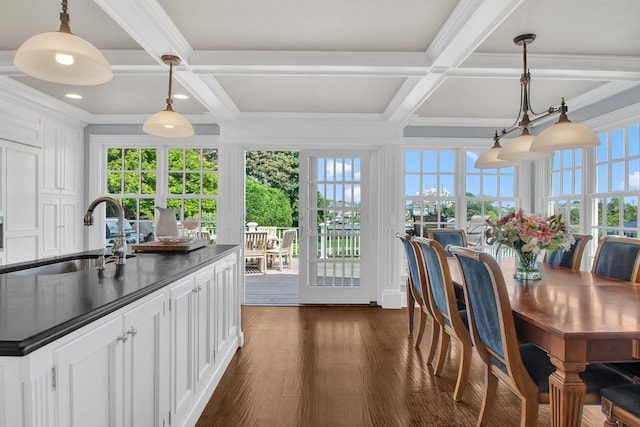 161 Wampum Ln, West Islip, NY 11795 - sunroom with a sink, plenty of natural light, wood finished floors, coffered ceiling, and beamed ceiling