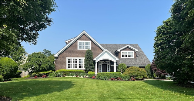 161 Wampum Ln, West Islip, NY 11795 - view of front of home with a front lawn