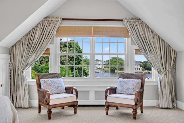 161 Wampum Ln, West Islip, NY 11795 - sitting room featuring lofted ceiling, carpet flooring, a water view, and baseboards