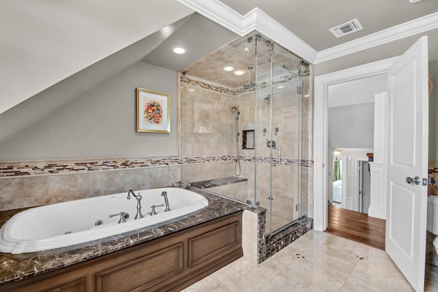 161 Wampum Ln, West Islip, NY 11795 - bathroom featuring a tub with jets, a shower stall, ornamental molding, and lofted ceiling