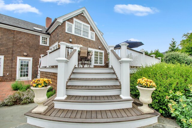 161 Wampum Ln, West Islip, NY 11795 - view of exterior entry featuring a wooden deck
