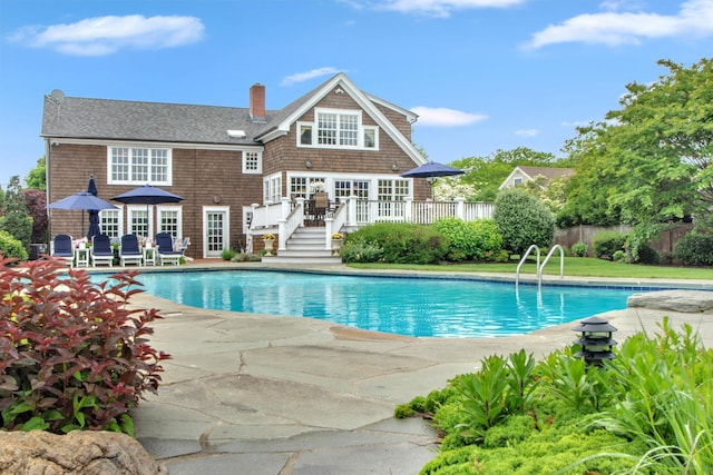 161 Wampum Ln, West Islip, NY 11795 - view of pool with a wooden deck and a patio