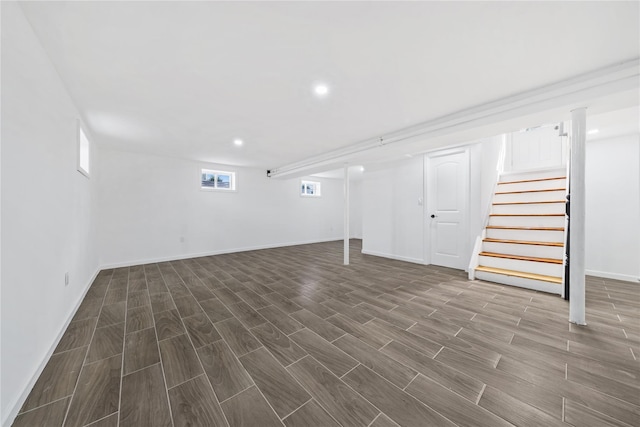 1779 Aladdin Ave, New Hyde Park, NY 11040 - below grade area featuring dark wood-type flooring, stairs, baseboards, and recessed lighting