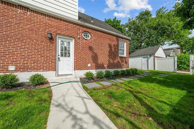 1779 Aladdin Ave, New Hyde Park, NY 11040 - entrance to property featuring a lawn and brick siding
