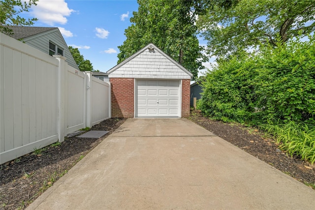 1779 Aladdin Ave, New Hyde Park, NY 11040 - detached garage featuring driveway