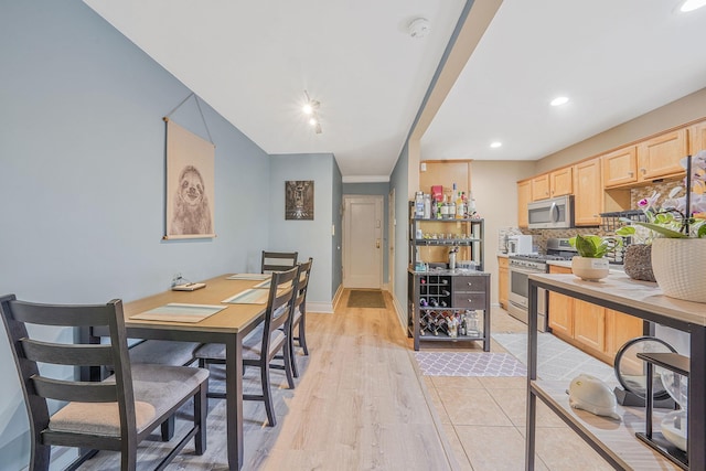 23 Edwards St Unit 1C, Roslyn Heights, NY 11577 - dining area featuring recessed lighting, light wood-style floors, and baseboards