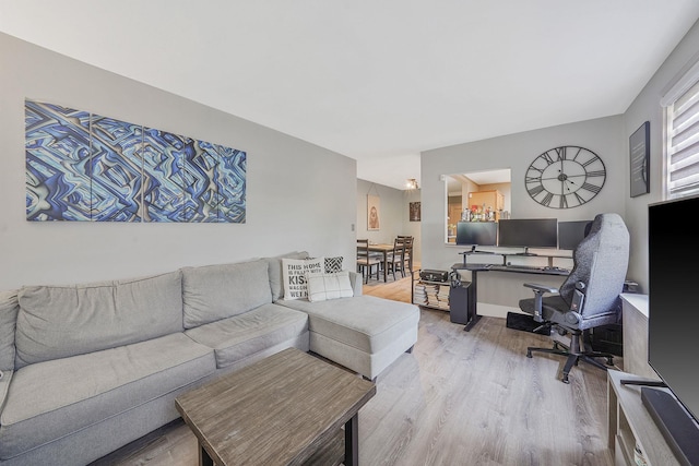 23 Edwards St Unit 1C, Roslyn Heights, NY 11577 - living room featuring wood finished floors and a desk