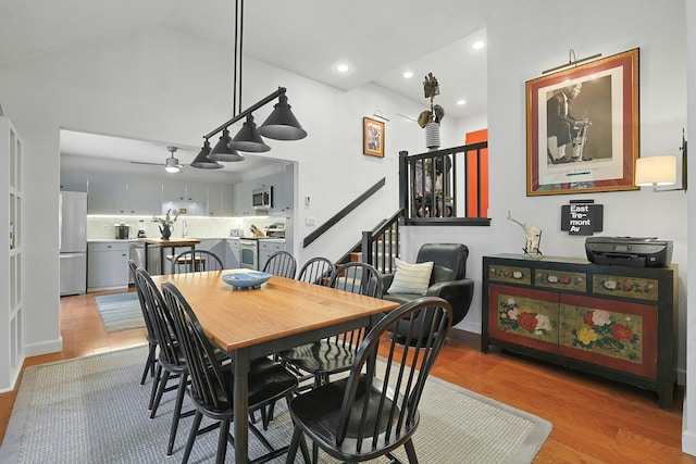 963 Heritage Hls Unit C, Somers, NY 10589 - dining room with light wood-style flooring, ceiling fan, vaulted ceiling, and recessed lighting