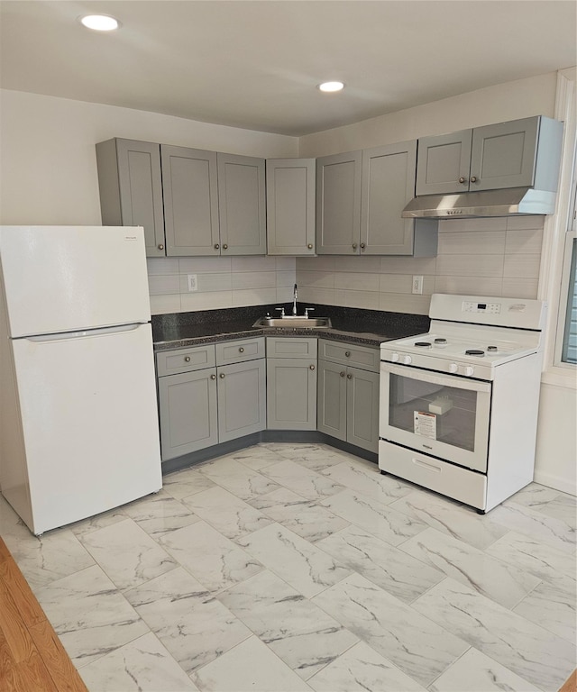 495 Milford St, Brooklyn, NY 11208 - kitchen featuring white appliances, under cabinet range hood, gray cabinetry, light marble finish floors, and recessed lighting