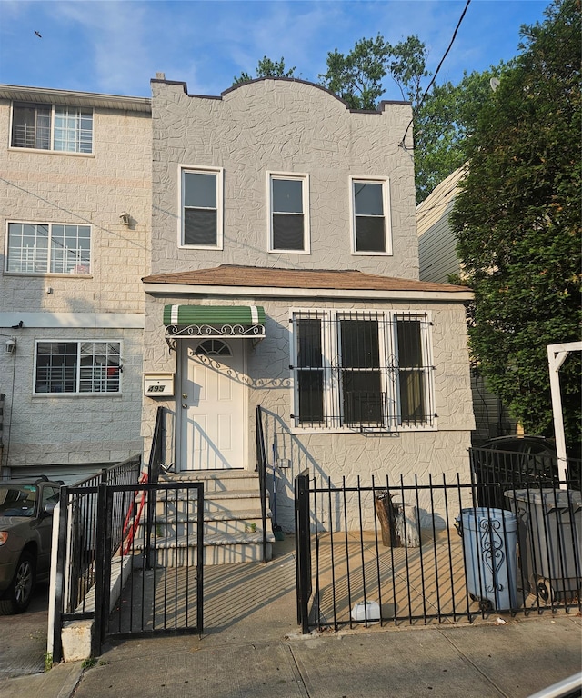 495 Milford St, Brooklyn, NY 11208 - view of front of property with a fenced front yard