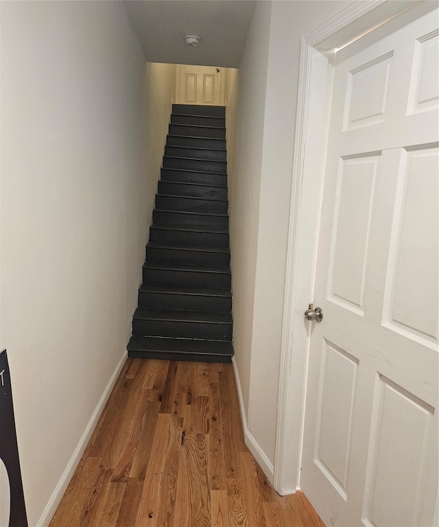 495 Milford St, Brooklyn, NY 11208 - staircase with wood finished floors and baseboards