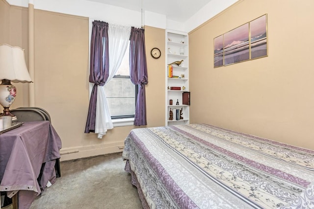 137-139 W 142nd St Unit 2D, New York Manhattan, NY 10030 - carpeted bedroom with a baseboard radiator and baseboards