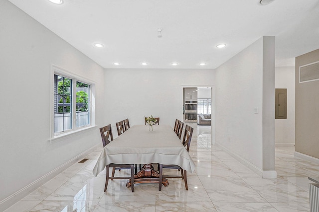 345 Washington Ave, Cedarhurst, NY 11516 - dining room with light marble finish floors, electric panel, baseboards, and recessed lighting