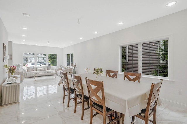 345 Washington Ave, Cedarhurst, NY 11516 - dining space featuring light marble finish flooring, recessed lighting, and baseboards