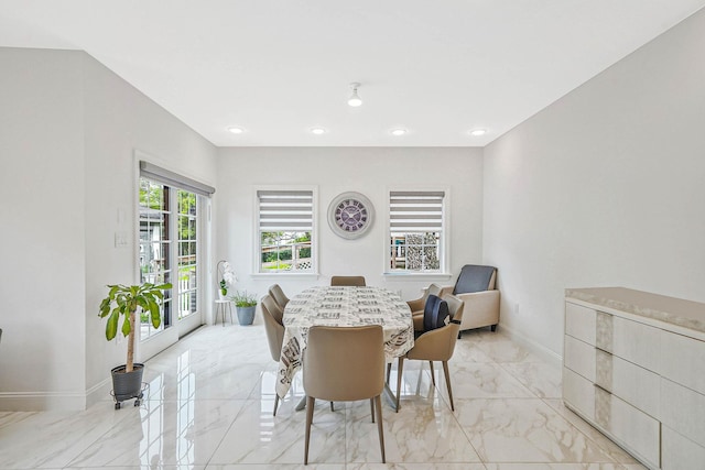 345 Washington Ave, Cedarhurst, NY 11516 - dining space featuring light marble finish flooring, baseboards, and recessed lighting