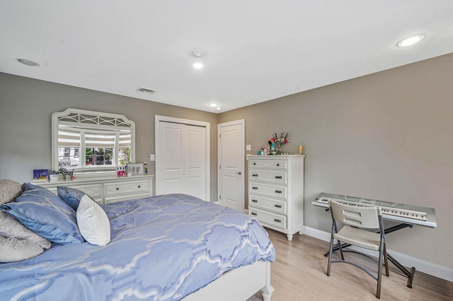 345 Washington Ave, Cedarhurst, NY 11516 - bedroom with light wood finished floors, baseboards, a closet, and recessed lighting