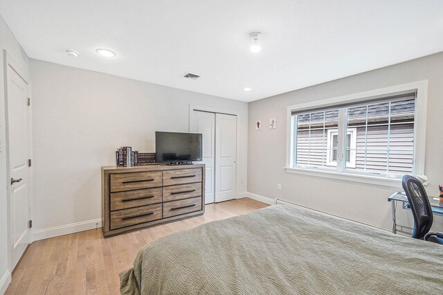 345 Washington Ave, Cedarhurst, NY 11516 - bedroom with light wood finished floors, baseboards, a closet, and recessed lighting