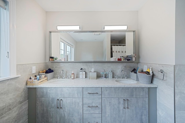 345 Washington Ave, Cedarhurst, NY 11516 - bathroom with tile walls and double vanity