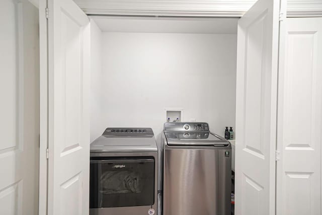 345 Washington Ave, Cedarhurst, NY 11516 - laundry area with washer and clothes dryer