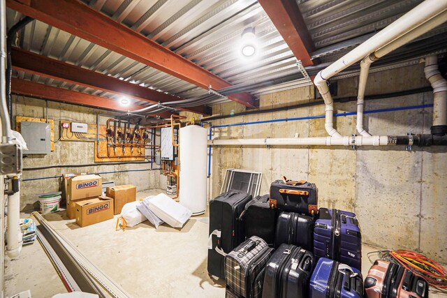 345 Washington Ave, Cedarhurst, NY 11516 - unfinished below grade area featuring water heater and electric panel