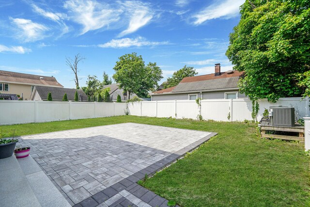 345 Washington Ave, Cedarhurst, NY 11516 - view of yard with cooling unit and a patio