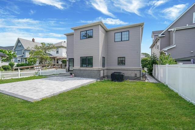 345 Washington Ave, Cedarhurst, NY 11516 - rear view of property featuring a patio