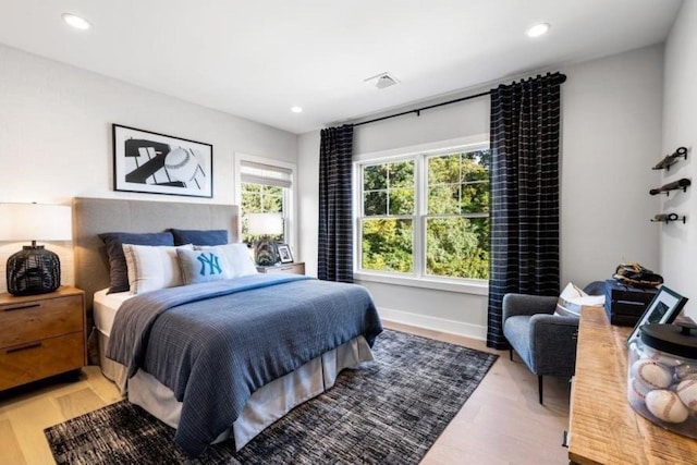 9 Sienna Ct, Dix Hills, NY 11746 - bedroom with light wood-type flooring, recessed lighting, and baseboards