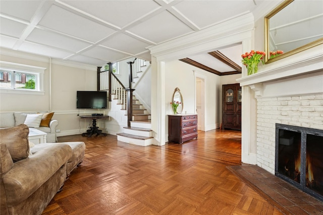 58 Garden St, Garden City, NY 11530 - living room featuring coffered ceiling, stairway, and a brick fireplace