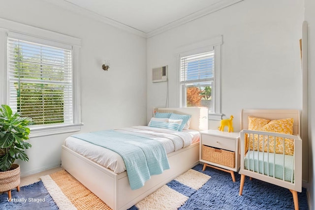 58 Garden St, Garden City, NY 11530 - bedroom with multiple windows, crown molding, and a wall mounted air conditioner